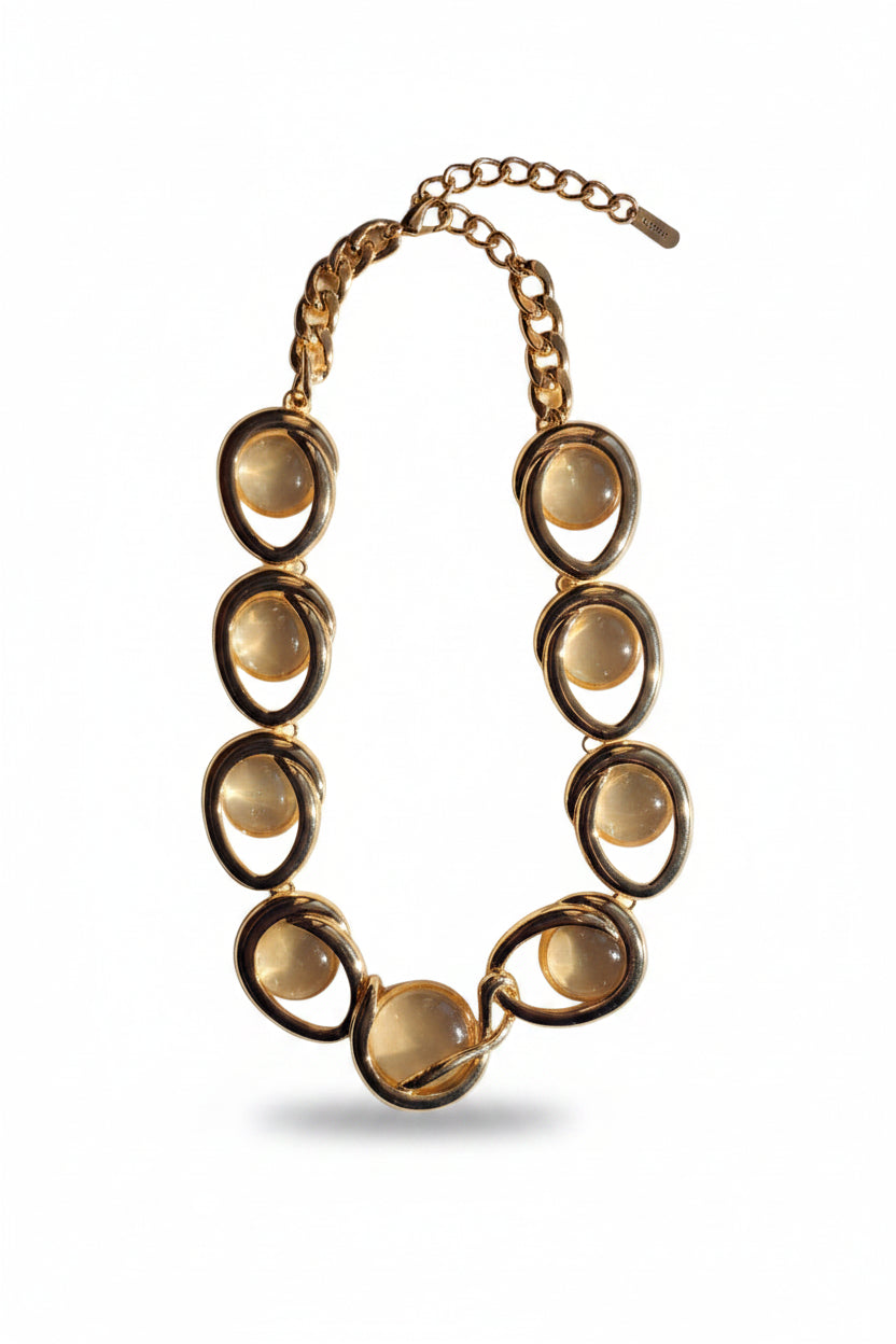NAMM94-NAMMOS-COLLAR CIRCUOS DORADOS CON LUPA BLANCA-S1266